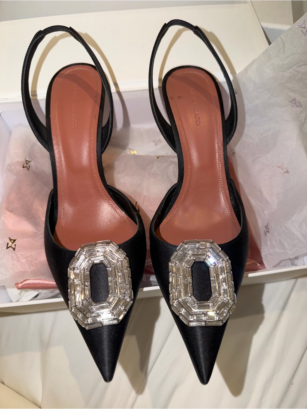 Amina Muaddi Black Pointed Slingback Pumps with Crystal Buckle